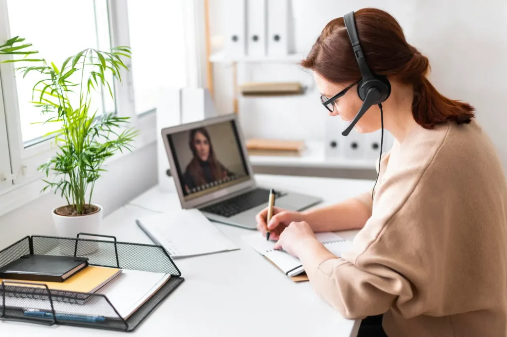 Virtual Assistants 1 portrait woman work having video call laptop